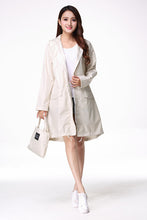 Freesmily Women's Stylish Rain Poncho Waterproof Rain Coat With Hood Sleeves and Pocket